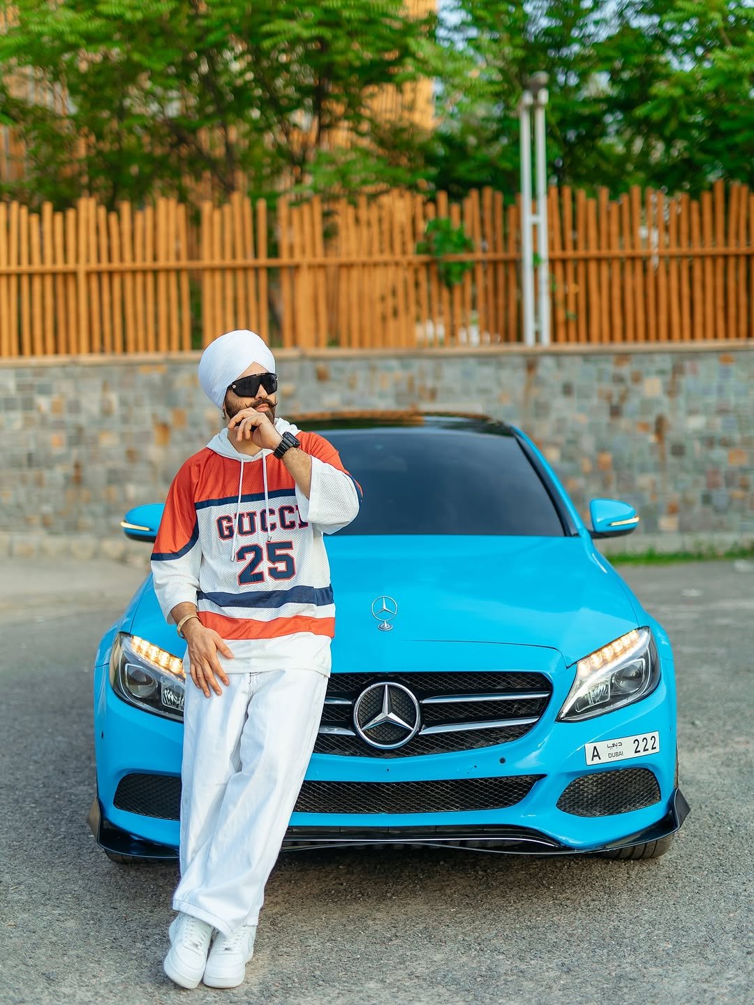 Photo by HARPREET SINGH on November 02, 2025. May be an image of car, face mask, road and text that says 'mlll GUCCI 25 Pad ኑ เสน AB222 222'.