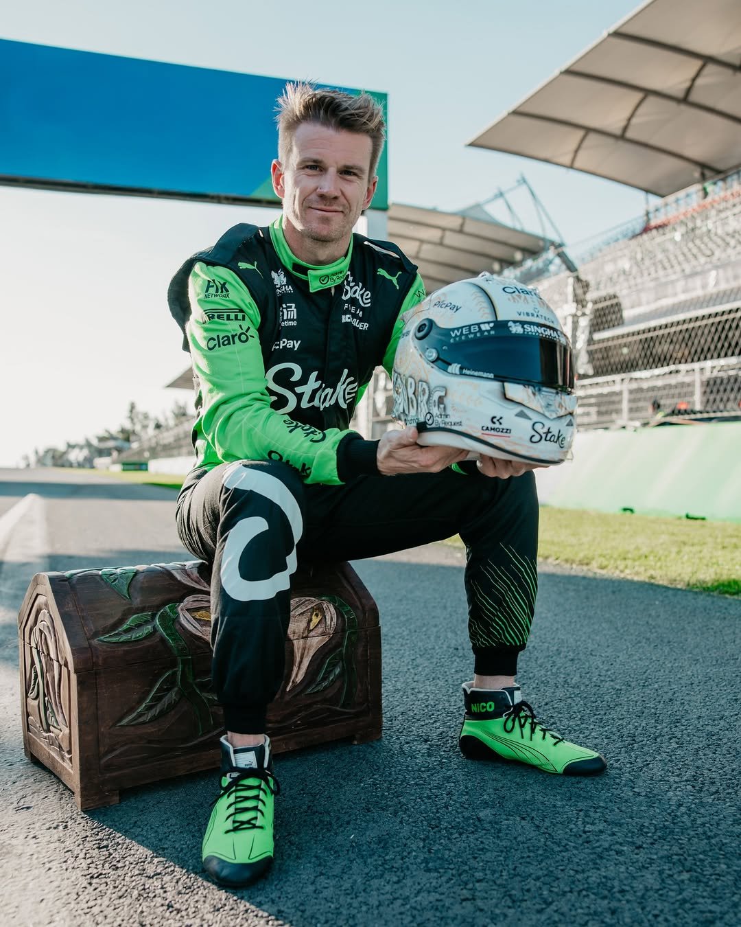 Photo shared by F1 Authentics® on October 29, 2025 tagging @hulkhulkenberg, and @hahn_air. May be an image of racing vehicles, race car, helmet, glasses and text.