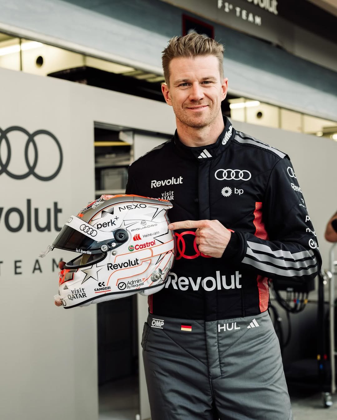 Photo shared by Heinemann Dutyfree on February 17, 2026 tagging @hulkhulkenberg. May be an image of racing vehicles, race car, helmet and text.