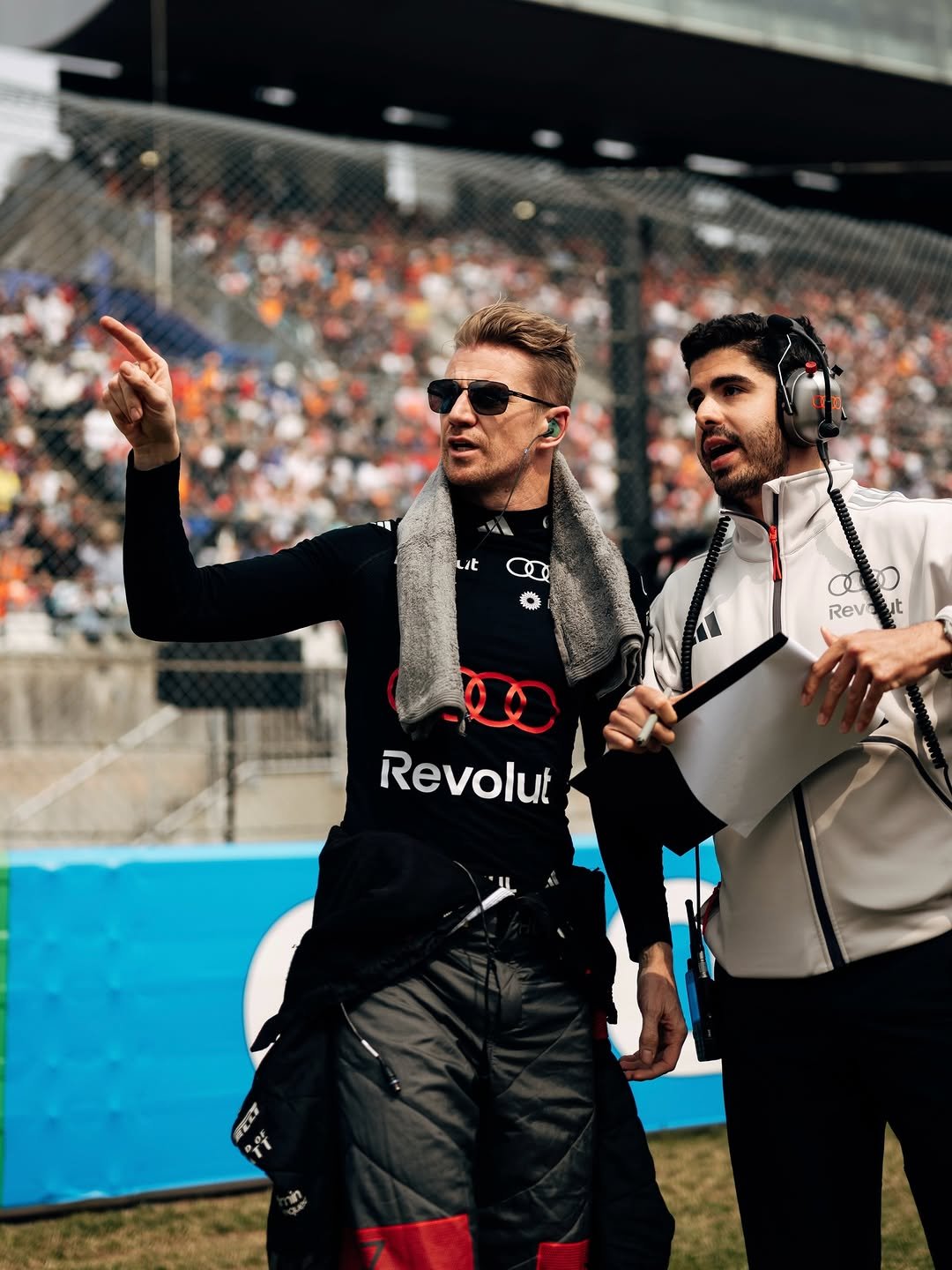 Photo shared by Nico Hulkenberg on March 29, 2026 tagging @audif1. May be an image of racing vehicles, stadium and text that says 'ቸና レt H CD Revait O Rev ut ጀ0 Revolut'.