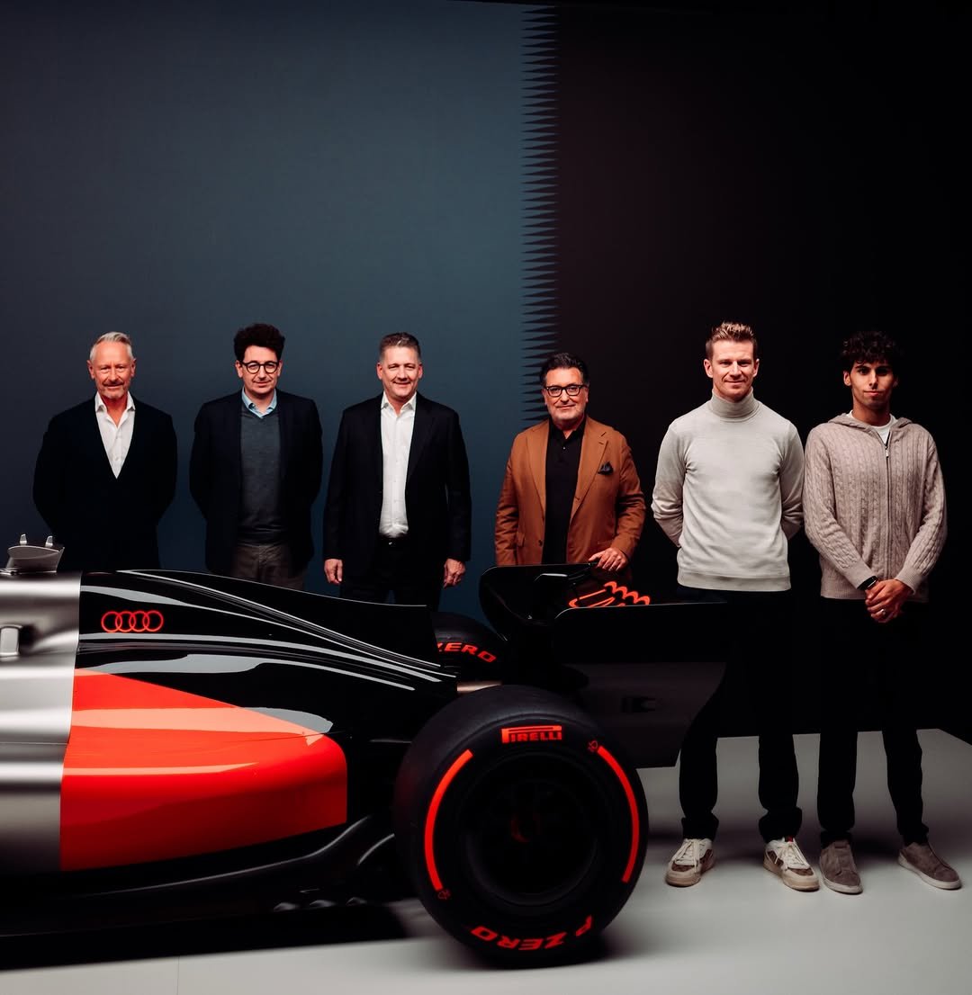 Photo shared by Nico Hulkenberg on November 13, 2025 tagging @gabrielbortoleto_, @audi, @j.m.wheatley, and @audif1. May be an image of racing vehicles, race car and text that says 'ወ7 0110 PRELL RELLI'.