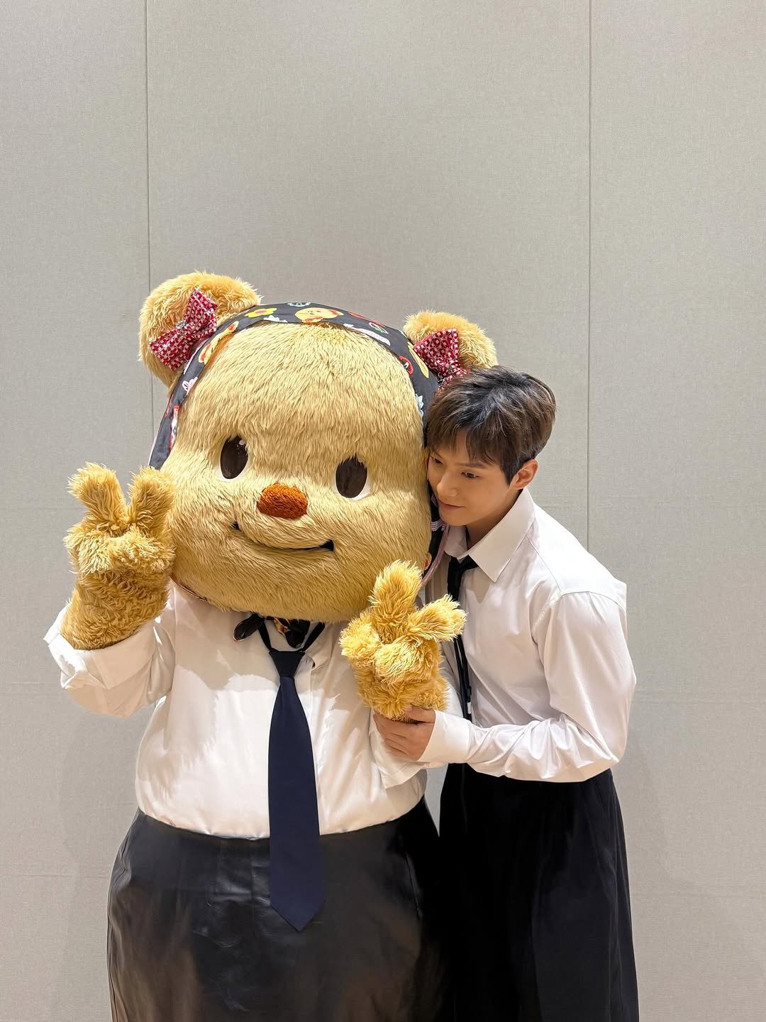 Photo shared by 이민혁 on March 06, 2026 tagging @butterbear.th. May be an image of bear, costume, prairie gentian and text.