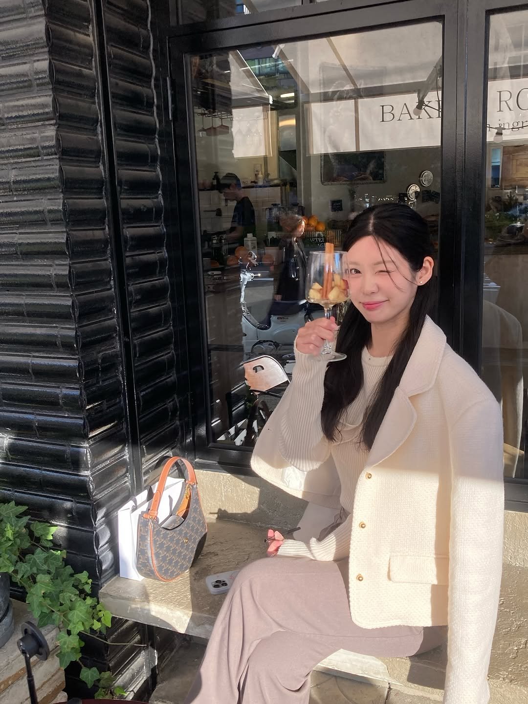 Photo shared by 황베리 on November 16, 2025 tagging @raftervillage. May be an image of duffle coat, overcoat and cornflower.