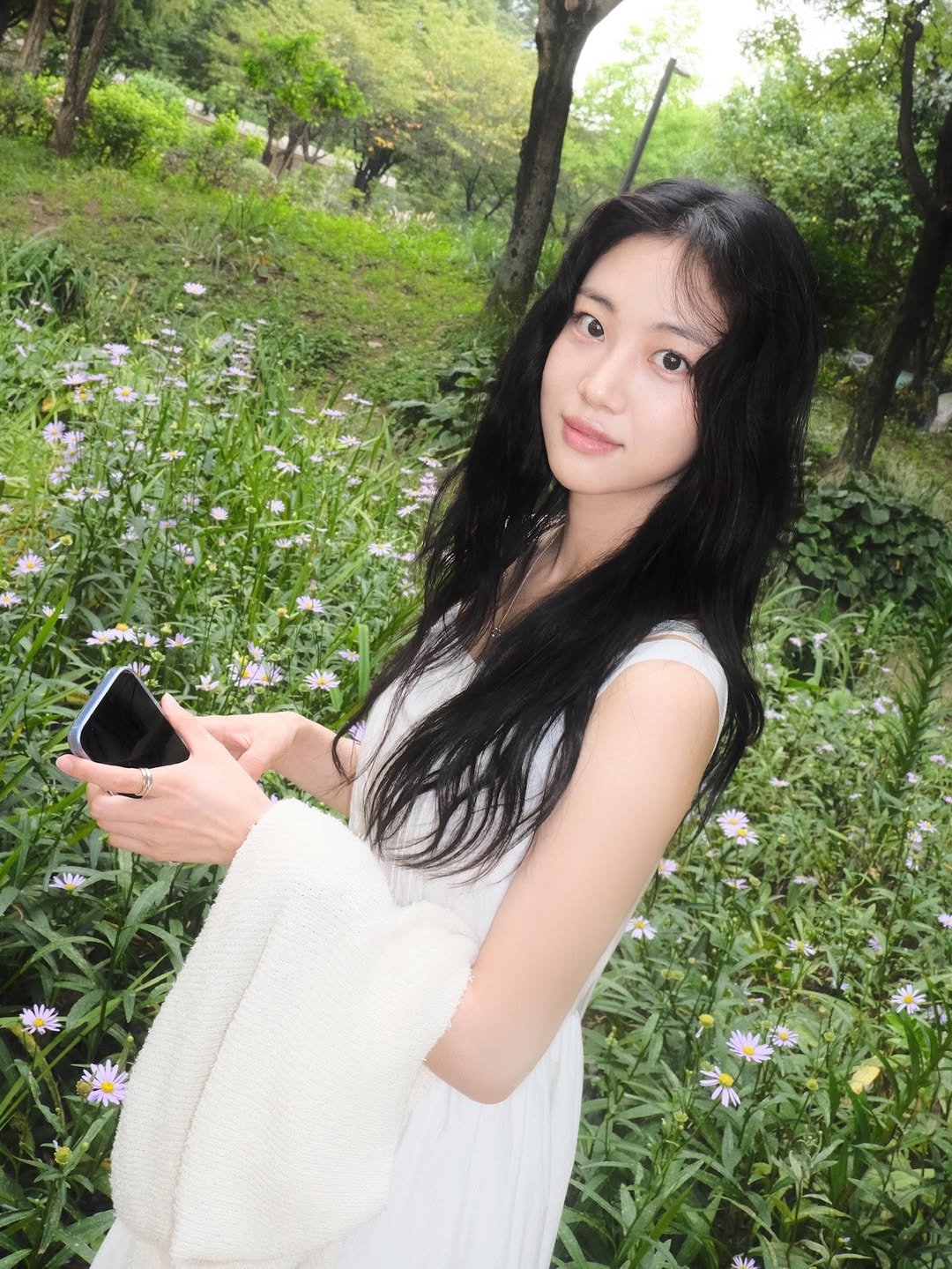 Photo by 홍화연 ••• Hong Hwayeon on September 17, 2025. May be an image of 1 person, prairie gentian, white lily, park and text.