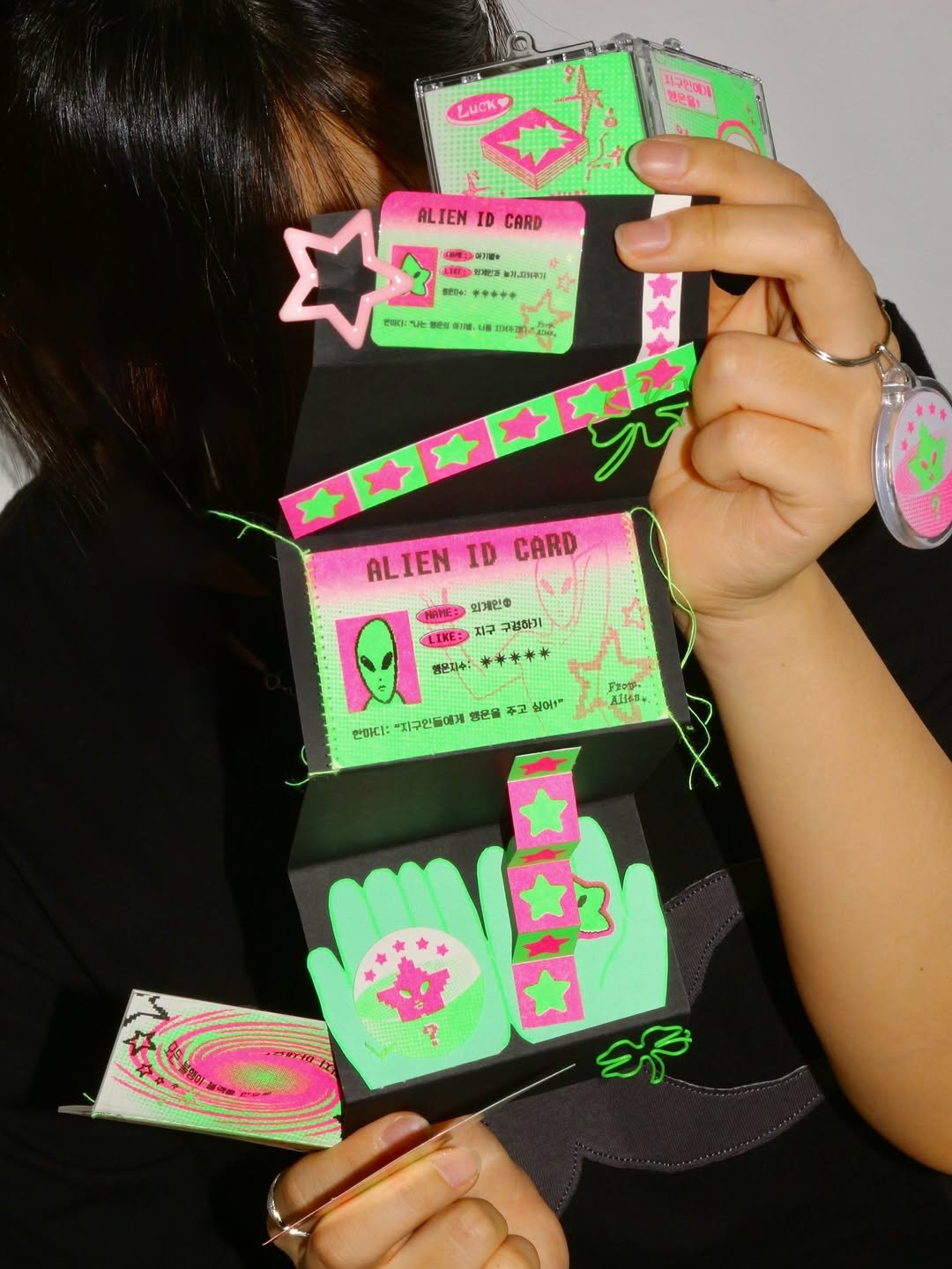 Photo shared by 하우풀리소클럽 HWFRISOCLUB on December 23, 2025 tagging @i_made_gold3. May be an image of card, bandage and text.