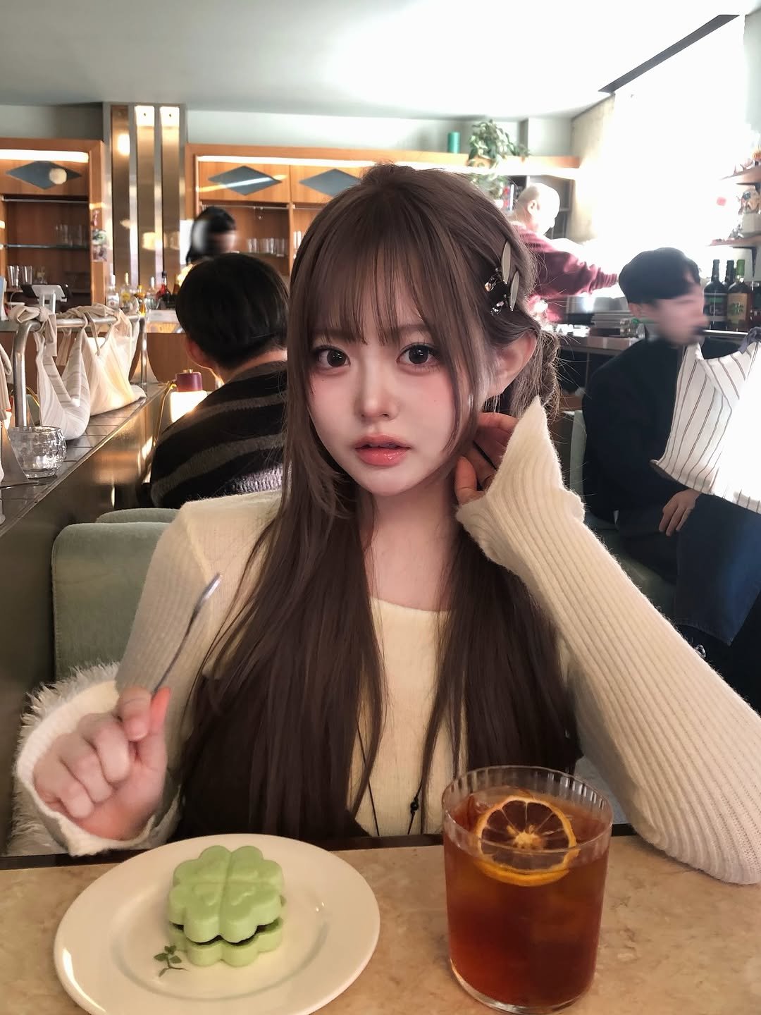 Photo by 혜리니 on January 22, 2026. May be an image of one or more people, hair, drink and text.