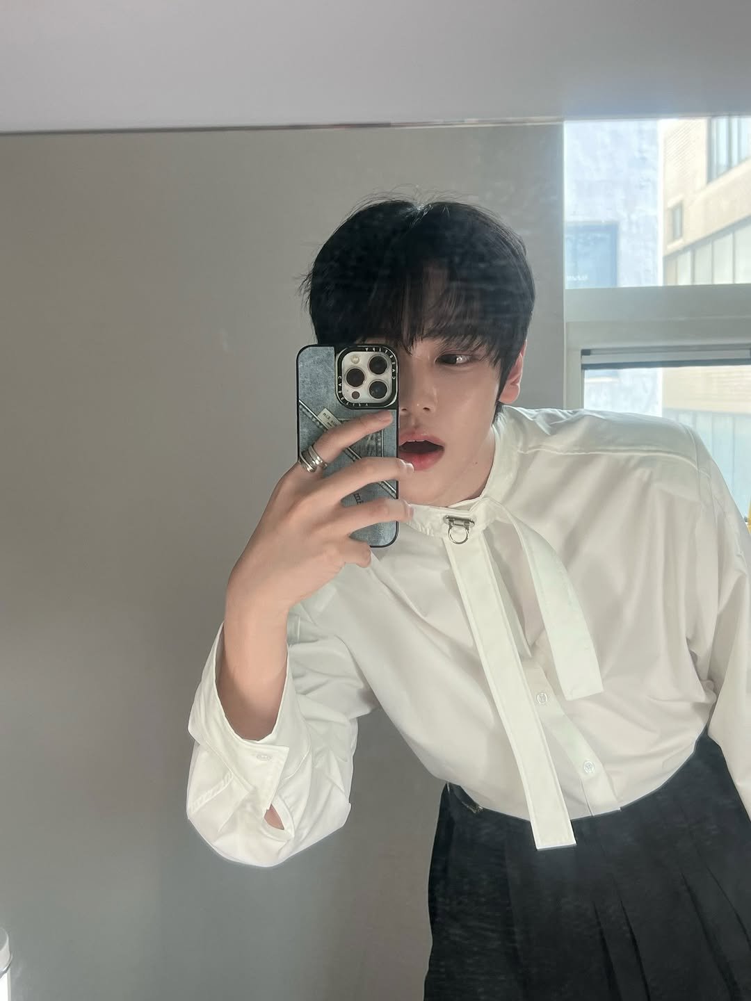 Photo by 장한음 HANEUM on December 31, 2025. May be an image of one or more people, hair, bolo tie, mirror, top and text.