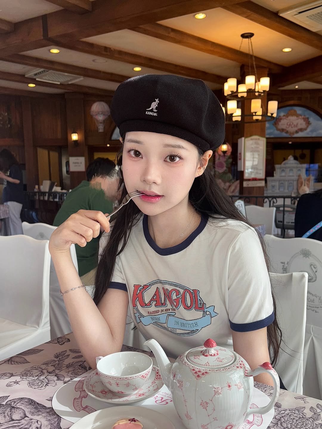 Photo shared by 조효민 on June 20, 2025 tagging @kangolkorea. May be an image of 2 people, hat, beret, tea and text.
