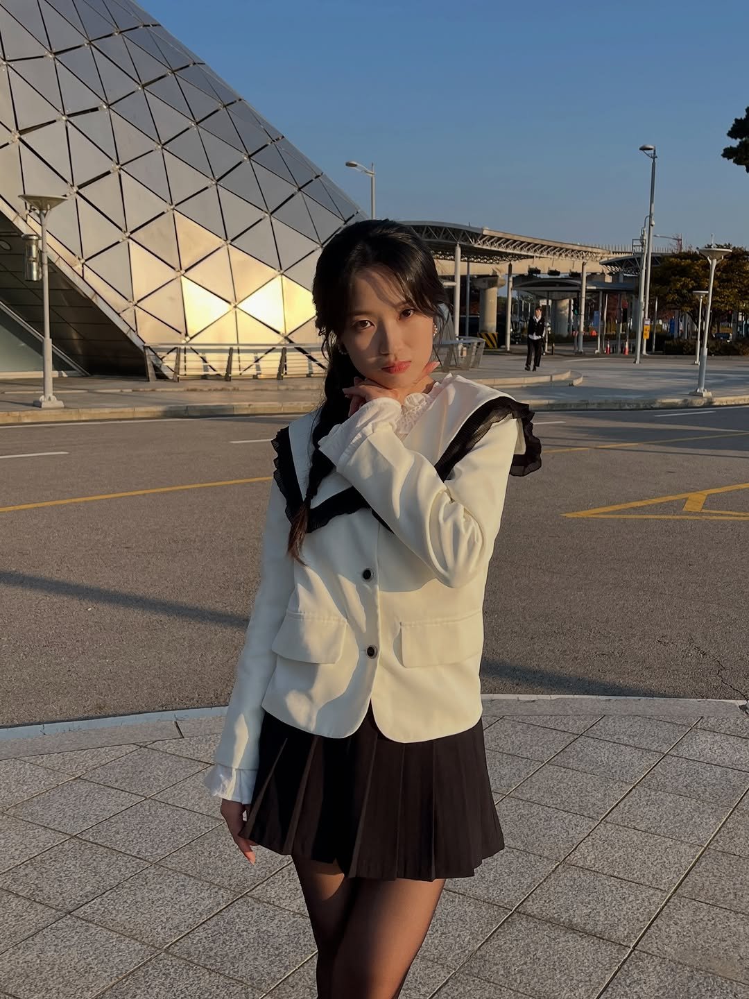 Photo by 김혜윤 on January 17, 2026. May be an image of suit, miniskirt, blazer and text.