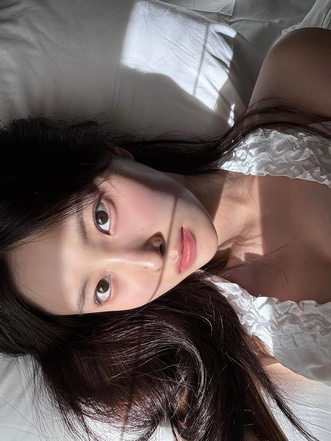 Photo by 강혜원 Kang hyewon on September 20, 2025. May be an image of 1 person, hair, sleepwear, slip and text.