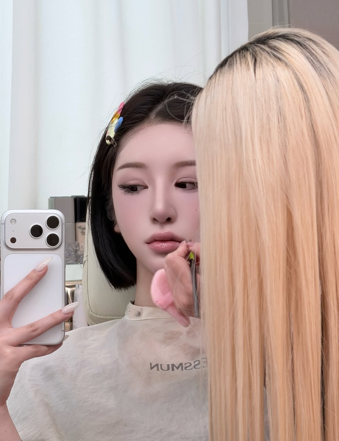 Photo by 이혜원 on February 28, 2026. May be a selfie of one or more people, blonde hair, braids, long hair, mirror and text.