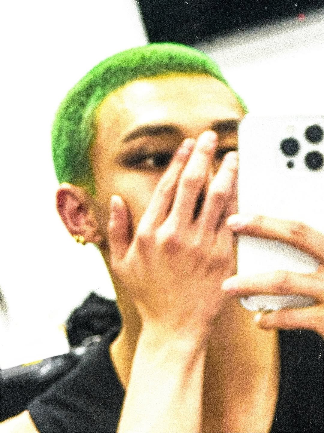 Photo by hyunjin on October 01, 2025. May be an image of one or more people, hair, phone and top.