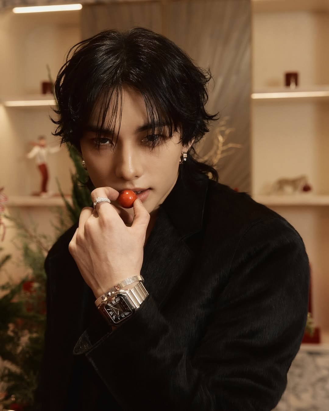 Photo by hyunjin on December 06, 2025. May be an image of one or more people, makeup, hair, bolo tie and text.