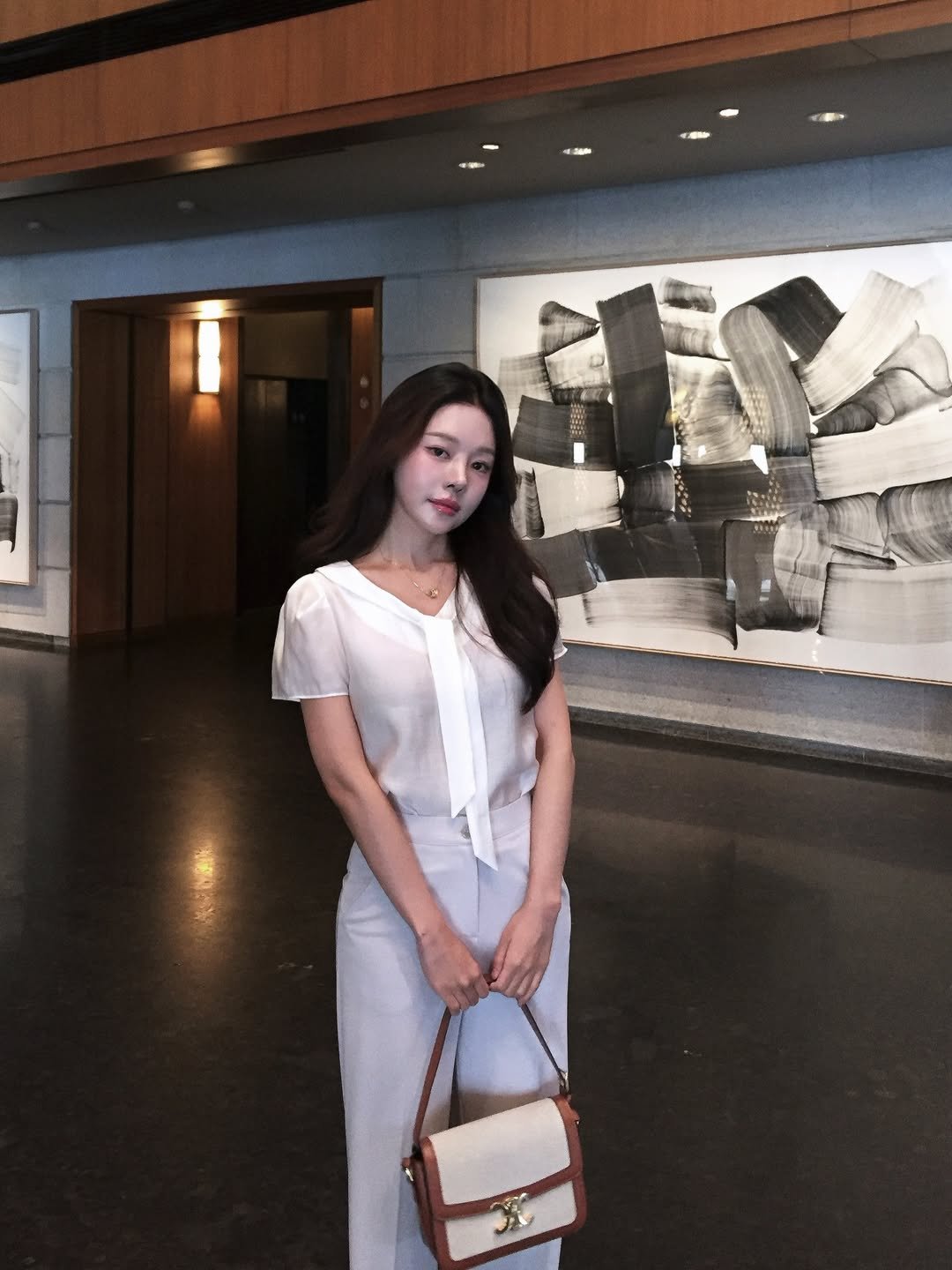 Photo by 조효진 Hyojin Cho on July 26, 2025. May be an image of 1 person, purse, cornflower and text.