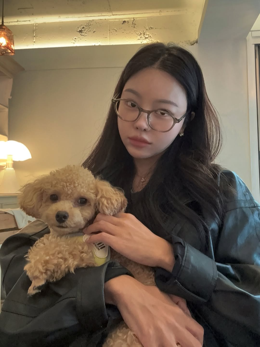 Photo by 조효진 Hyojin Cho on September 25, 2025. May be an image of 1 person, Bedlington terrier and text.