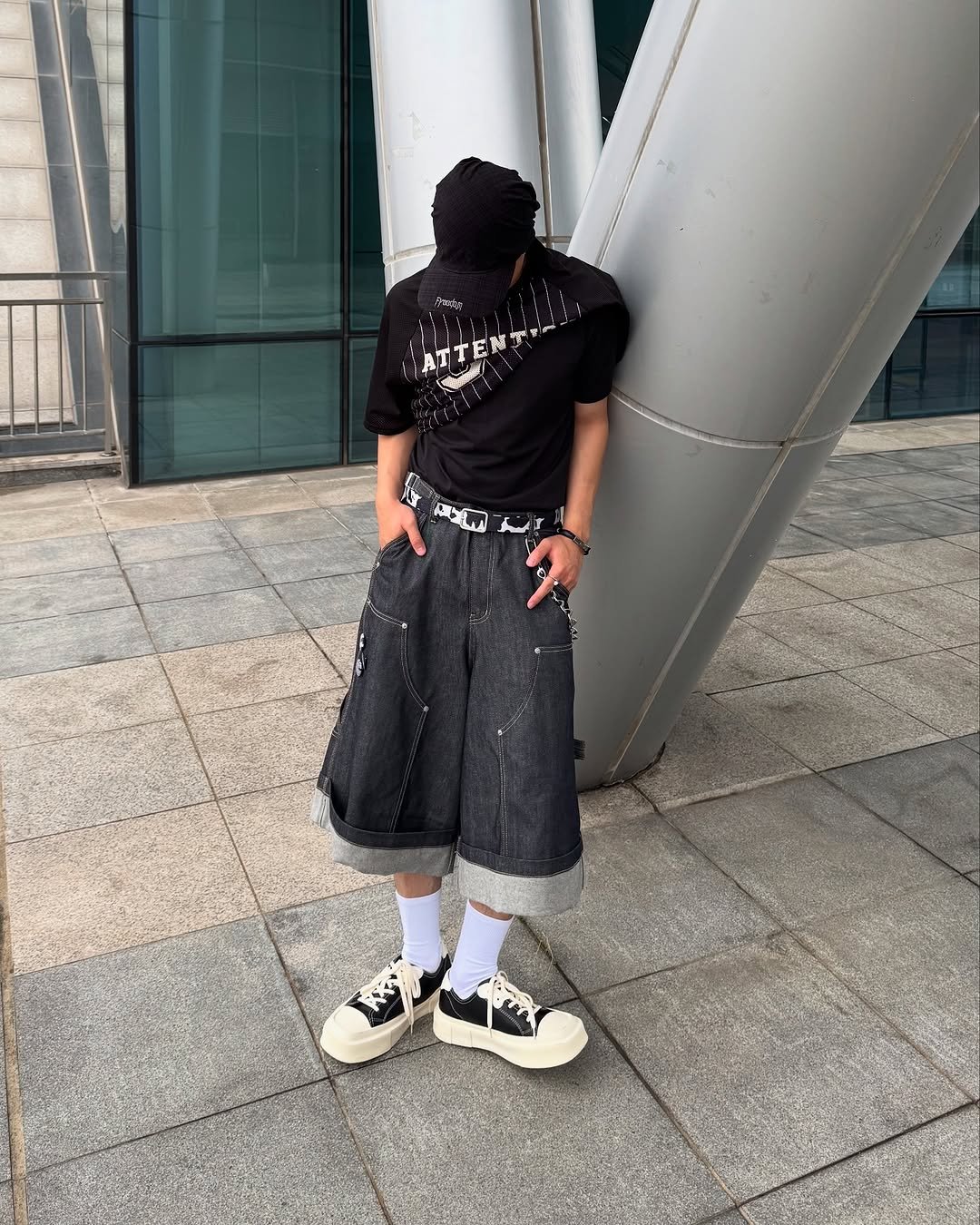 Photo shared by 황혁 on August 04, 2025 tagging @grailz_official, @koinseoul, and @mistakeproject_official. May be an image of 1 person, bandanna, kilt, sweatpants and text.