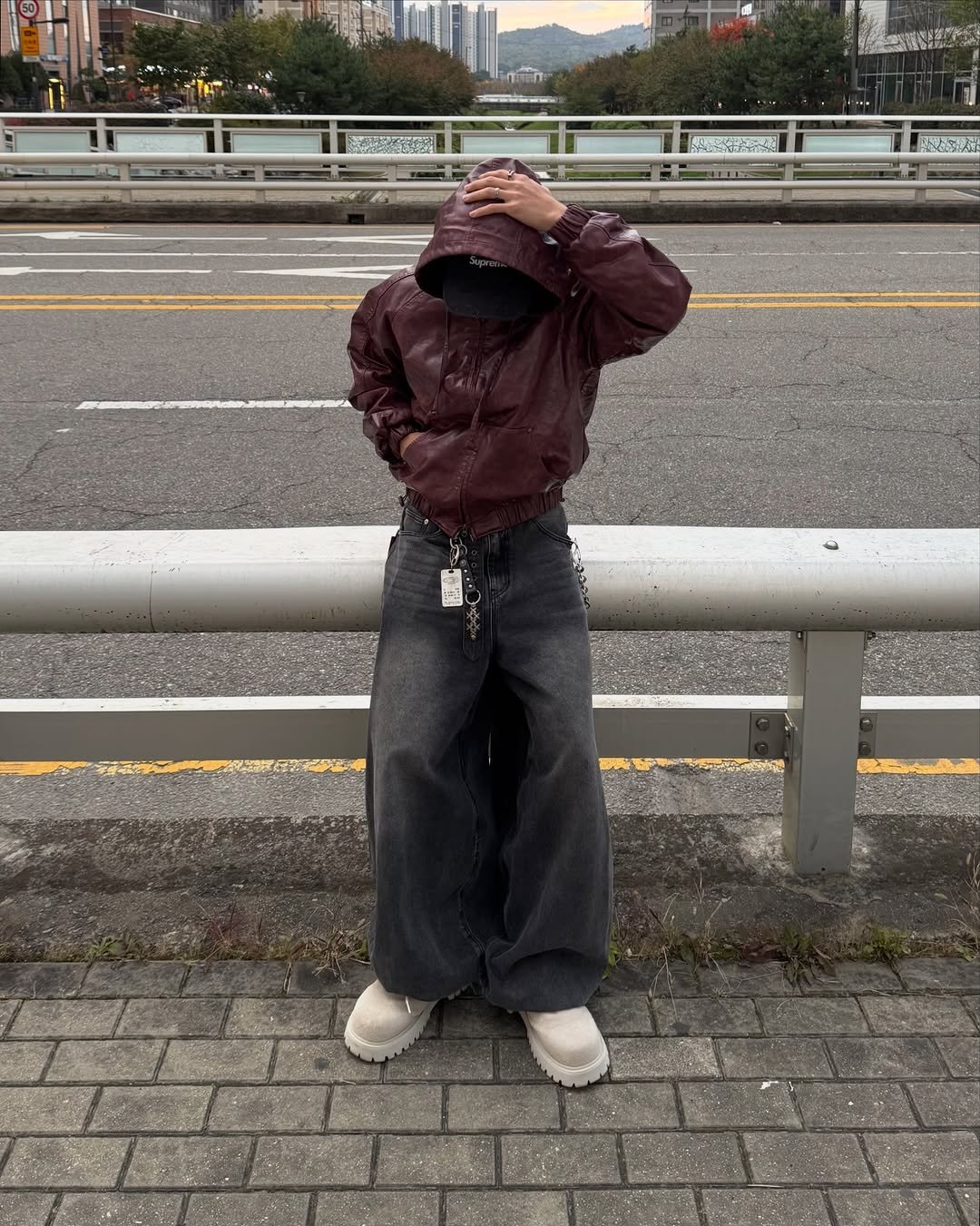 Photo shared by 황혁 on December 16, 2025 tagging @not4nerd, and @kichul.official. May be an image of duffle coat, parka, street and text.