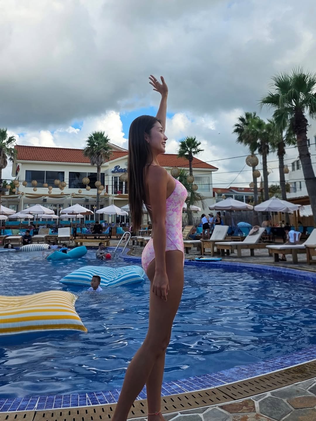 Photo shared by 김현지 / Hyunji Kim on September 11, 2025 tagging @calvinthecliff, @finebay_official, and @beachcliff.jeju. May be an image of 5 people, pool, cabana and text.