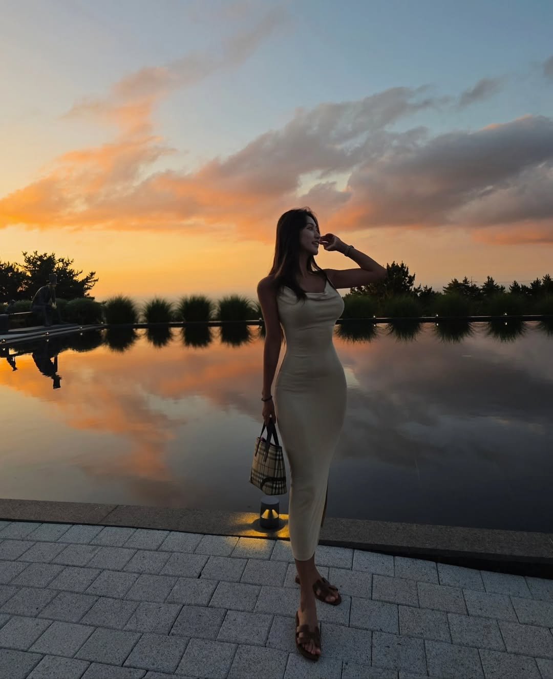 Photo by 김현지 / Hyunji Kim on March 23, 2026. May be an image of jumpsuit, twilight and text.