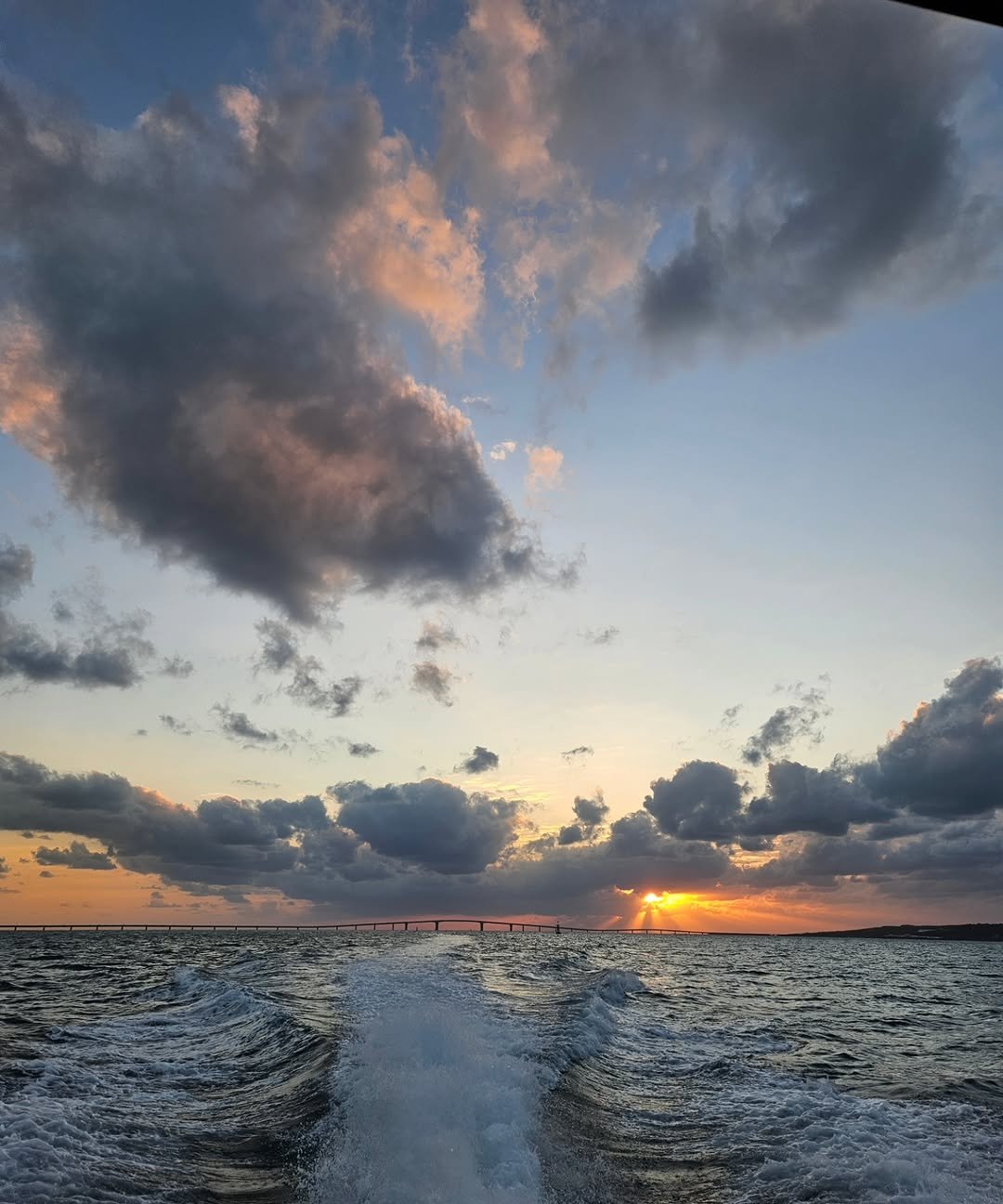 Photo by Hyunjoon Yoo on November 01, 2025. May be an image of boat, tornado, twilight, horizon, ocean and text.