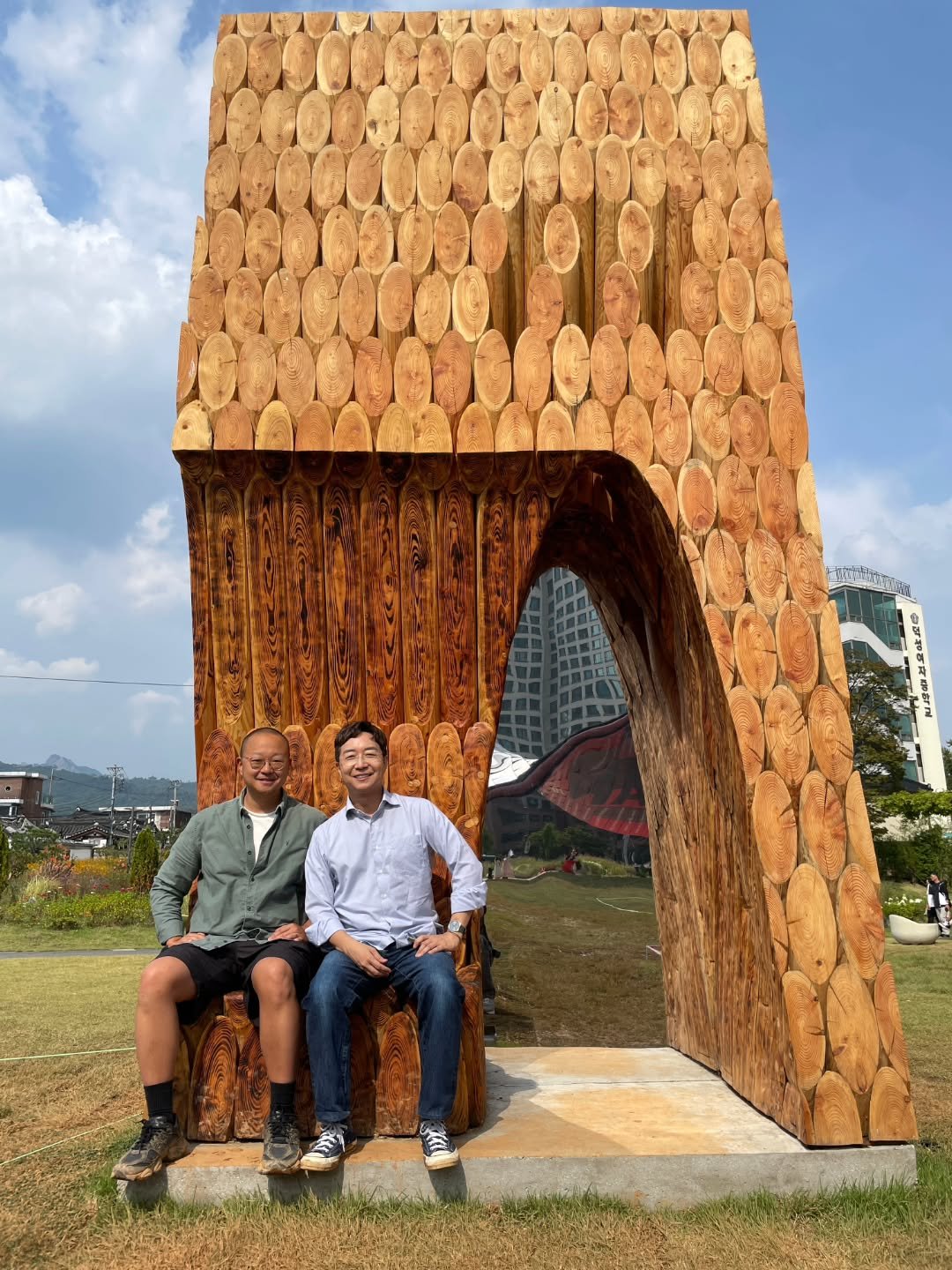 Photo by Hyunjoon Yoo on September 30, 2025. May be an image of 3 people, tower and text.