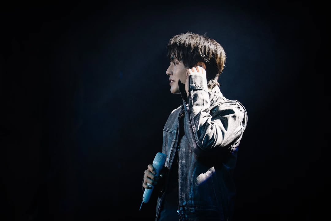 Photo by KIM HYUNJOONG on March 09, 2026. May be an image of one or more people, bangs, top, concert and text.