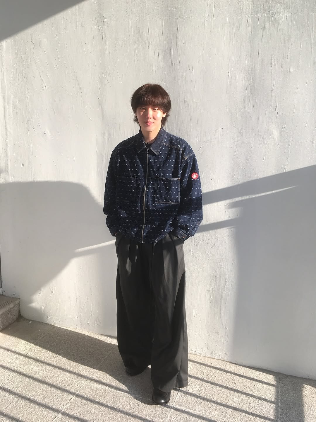 Photo by 윤현수 Yoon Hyunsoo on March 24, 2026. May be an image of duffle coat, turtleneck, parka, sweatpants and text.