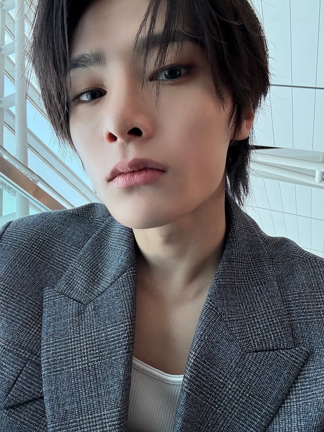 Photo by I.N on September 27, 2025. May be an image of one or more people, bangs, top, bolo tie, blazer and text.