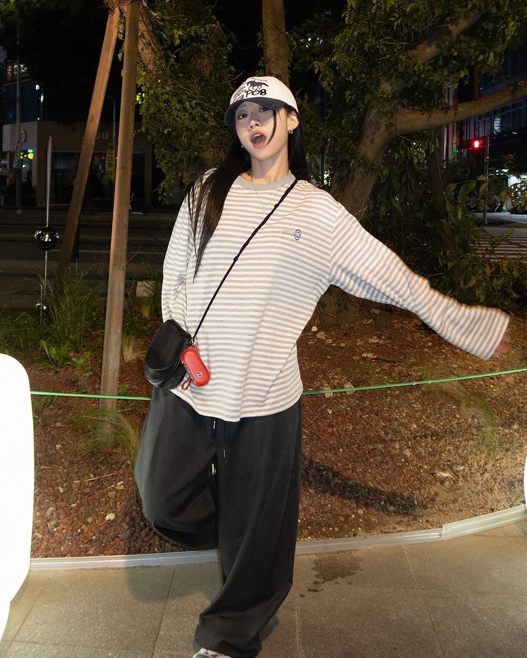 Photo shared by soal on October 10, 2025 tagging @musinsa.official, and @po8.official. May be an image of hat, parka, face mask, beret, fishnet stockings, sweatpants, street and text.