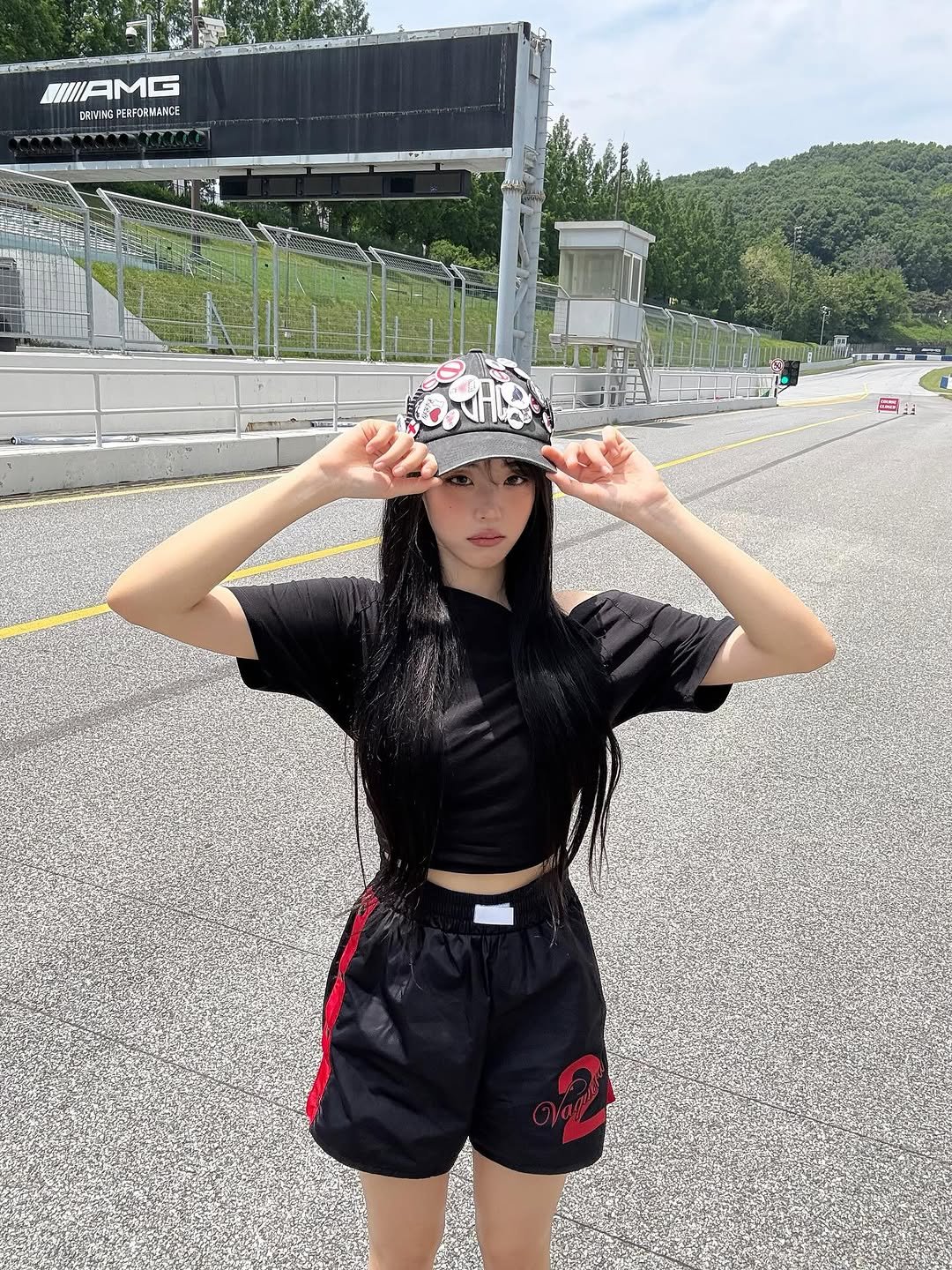 Photo by Hina ひな on July 06, 2025. May be an image of 2 people, hat, shorts, top and text that says 'WIIAMG DRIVING PERFORNANCE'.
