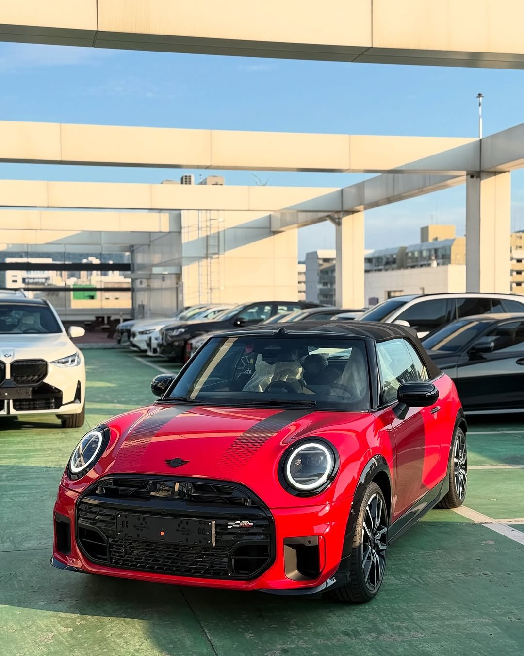 Photo shared by 미니쿠퍼 김은지팀장 on August 02, 2025 tagging @mini, @mini.korea.official, and @with._.mini. May be an image of race car, sedan and text.