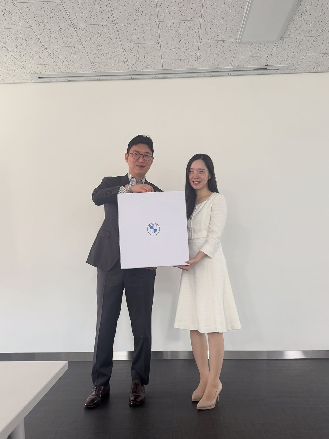 Photo shared by 미니쿠퍼 김은지팀장 on April 18, 2026 tagging @mini, @mini.korea.official, and @with._.mini. May be an image of suit, office and text.