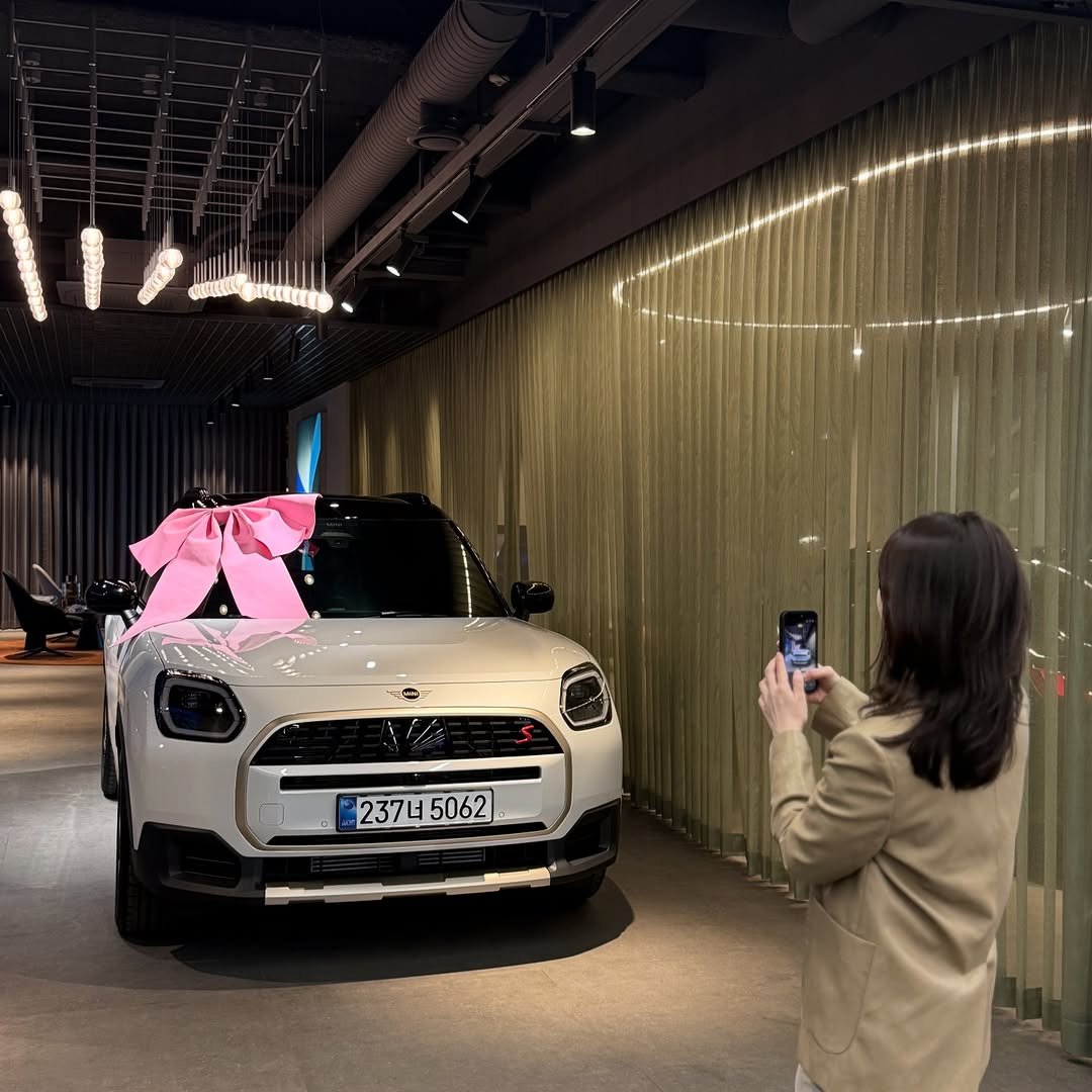 Photo shared by 미니쿠퍼 김은지팀장 on April 04, 2026 tagging @mini, @mini.korea.official, and @with._.mini. May be an image of minivan, car and text.