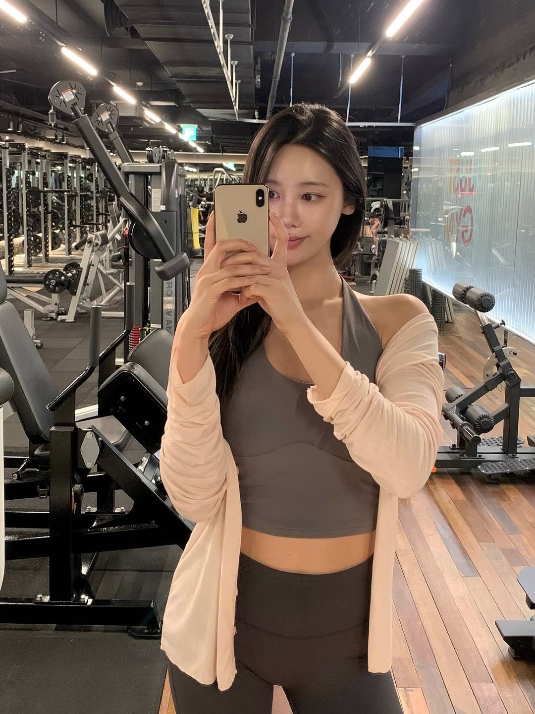 Photo shared by 하니 ᰔ on August 14, 2025 tagging @heily_kr. May be a selfie of 1 person, biceps, activewear, sportswear, treadmill, sweatpants and text.