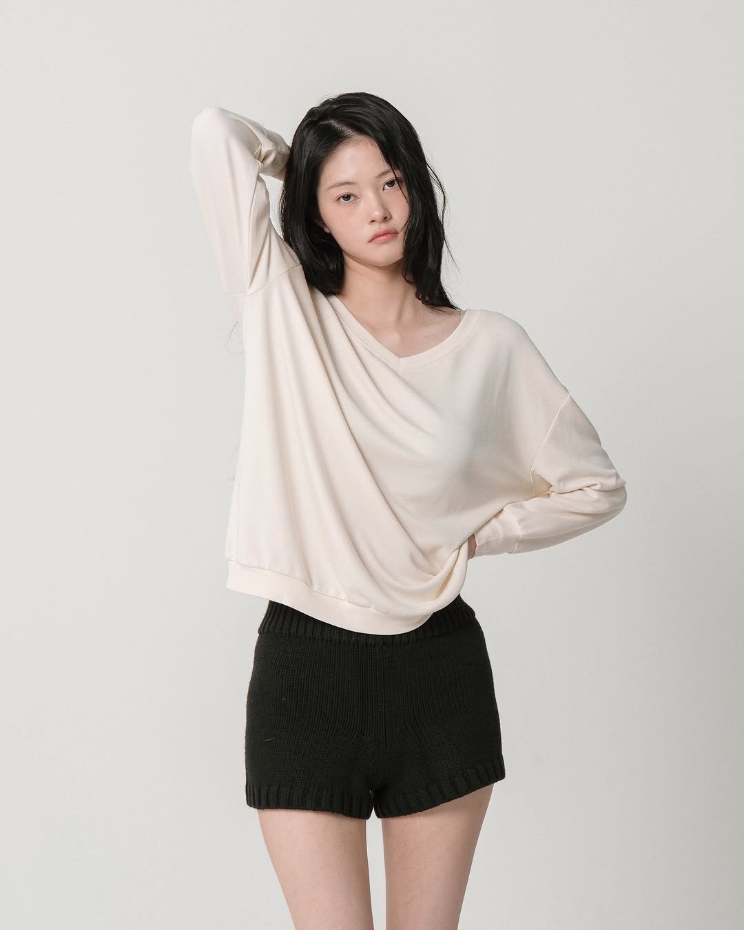 Photo by 나는꽃 on February 08, 2026. May be an image of sleepwear, shorts, miniskirt, top and text.