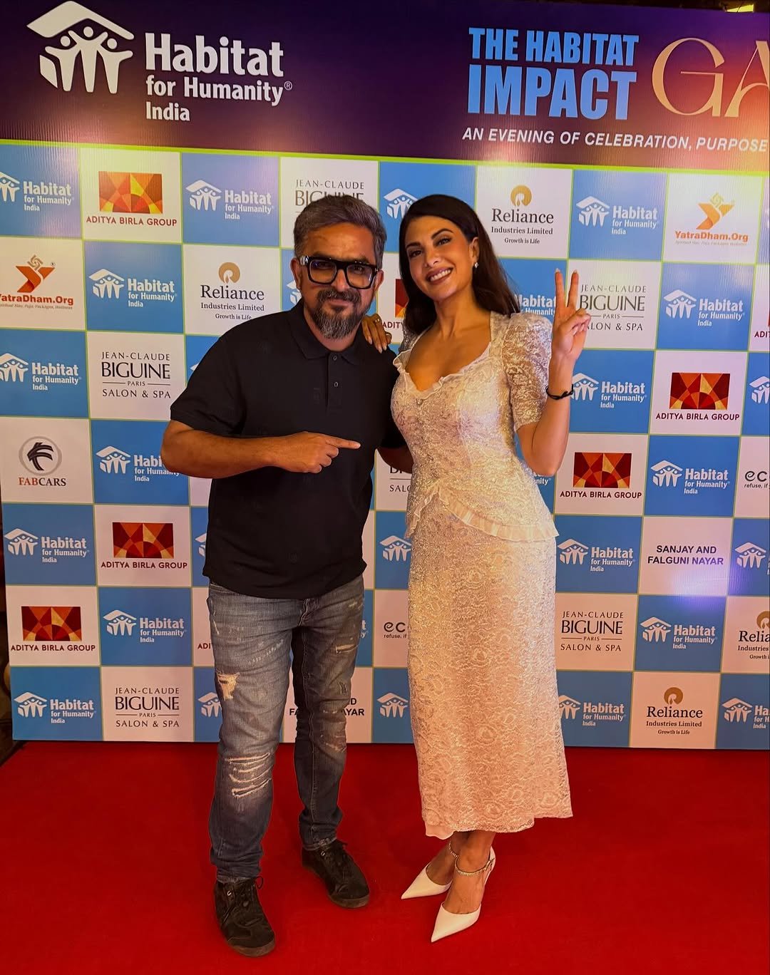 Photo shared by Hussain Mansuri on November 07, 2025 tagging @jacquelienefernandez. May be an image of one or more people, carpet, magazine and text.