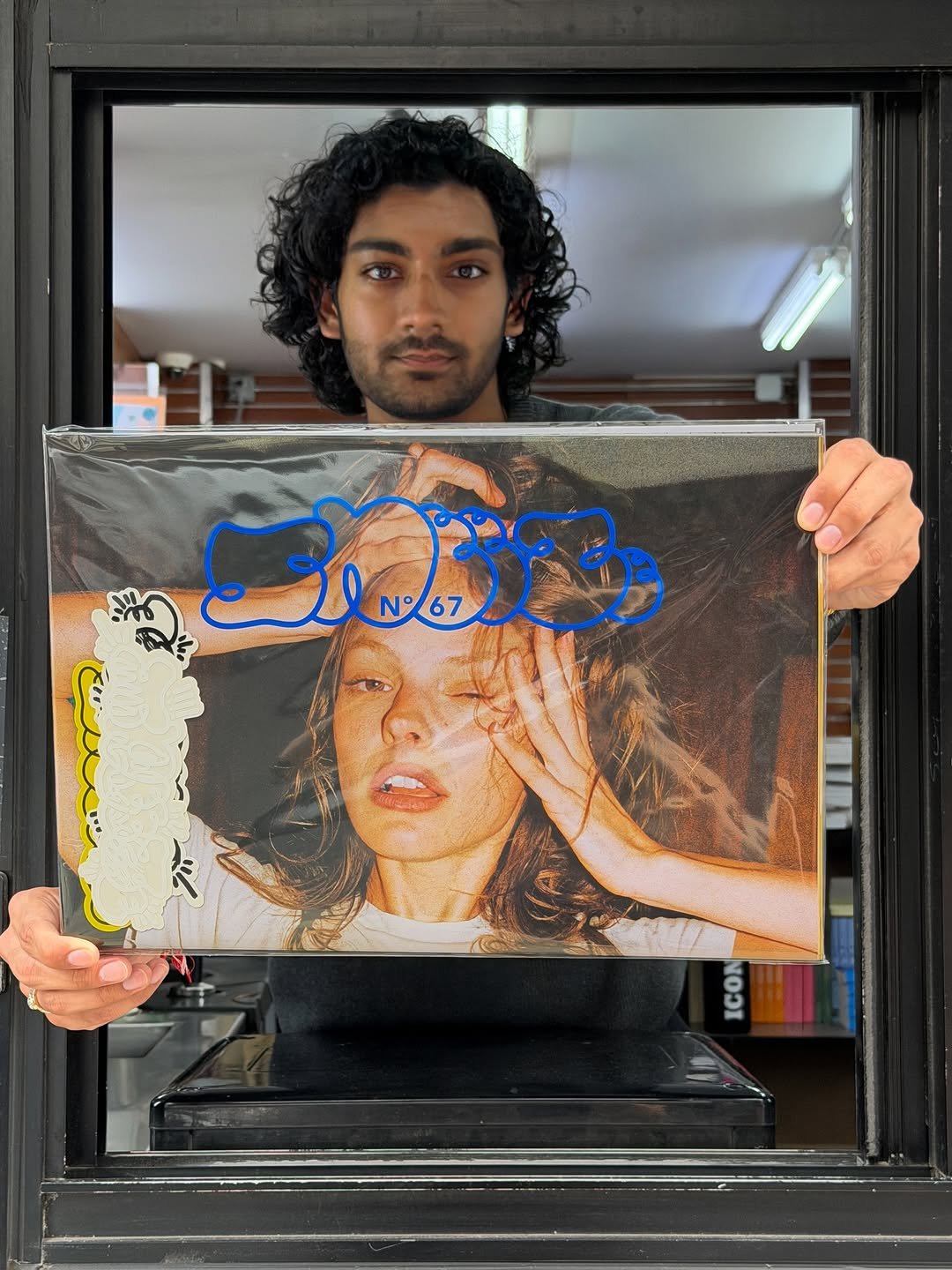 Photo by Iconic Magazines on April 03, 2026. May be art of picture frame, poster, magazine and text that says 'O33 8 ICON ၀'.