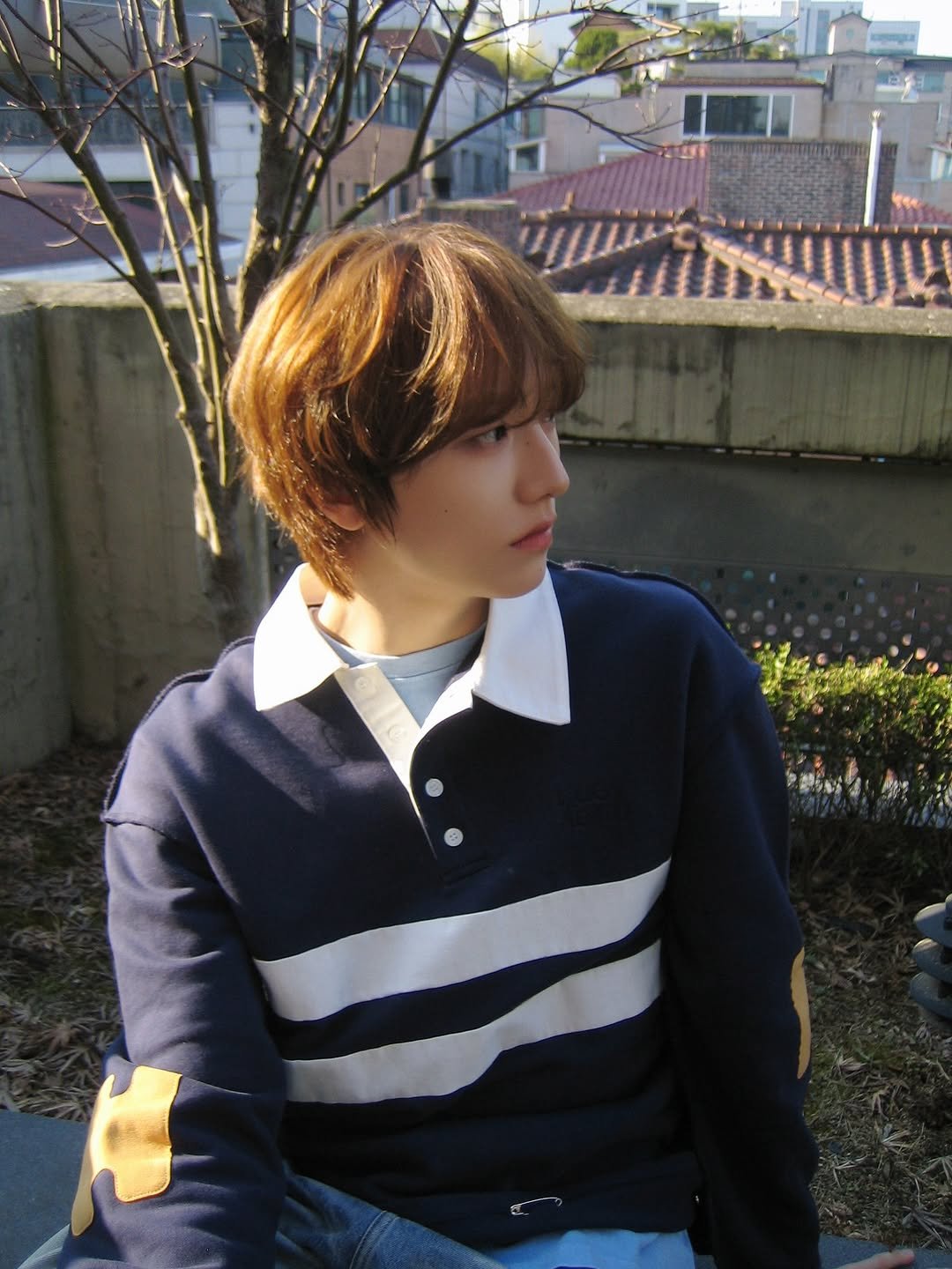 Photo by IDID on March 22, 2026. May be an image of one or more people, bangs, duffle coat and text.