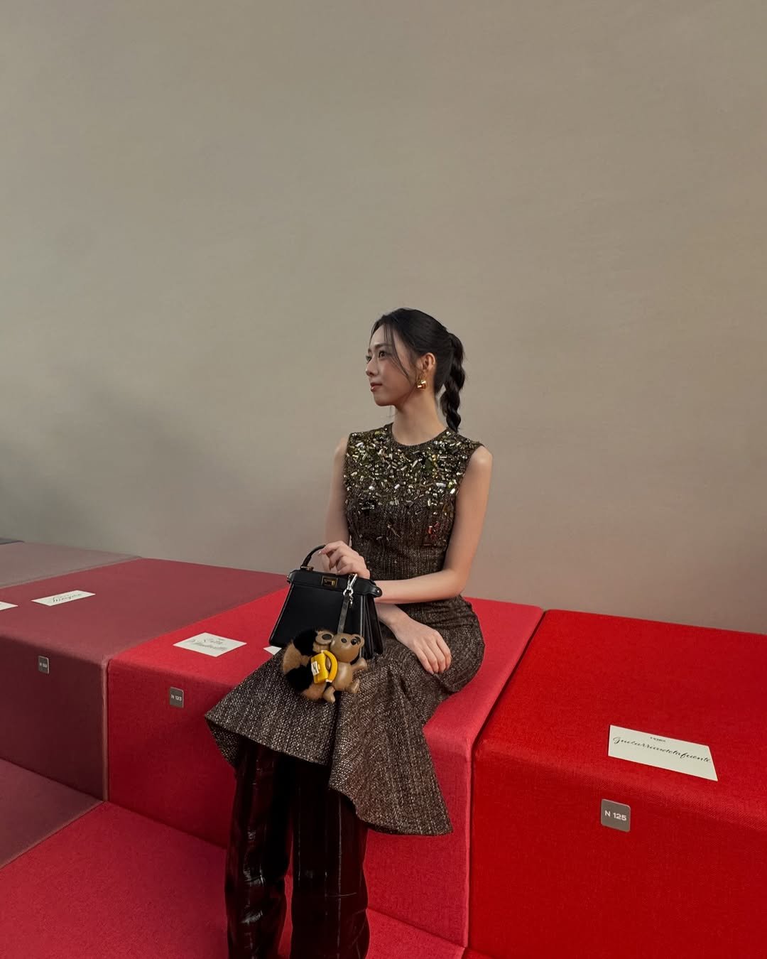 Photo by YUNA on September 24, 2025. May be an image of 1 person, carpet and text.