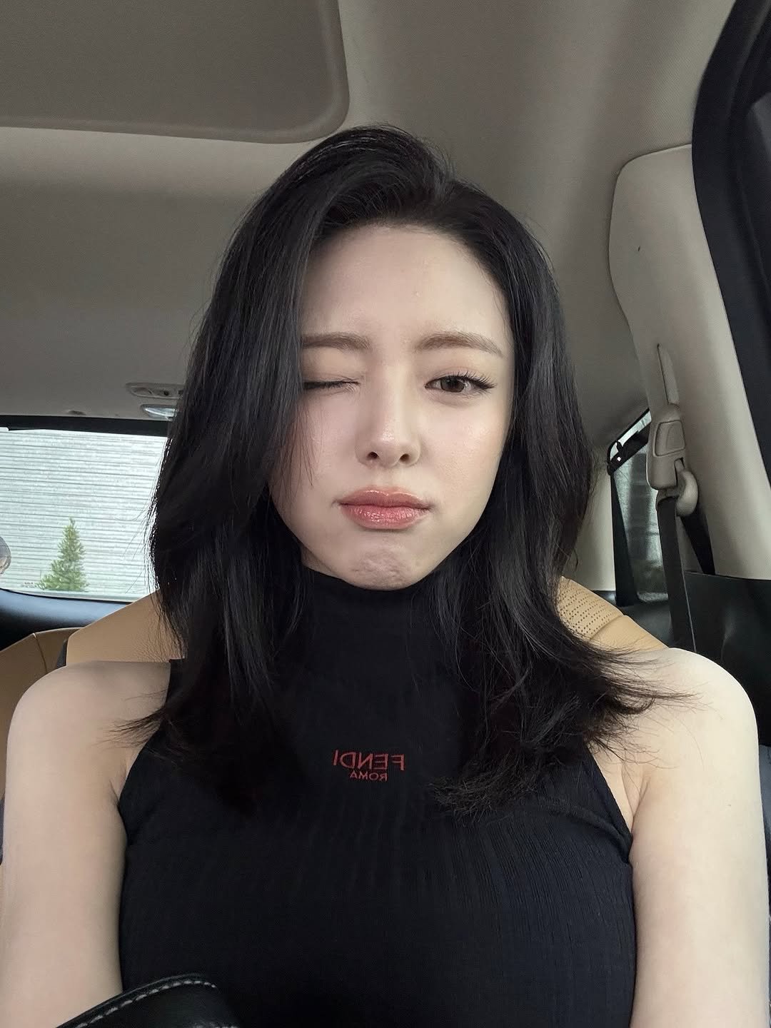 Photo by YUNA on September 25, 2025. May be an image of 1 person, hair, turtleneck, top and text.