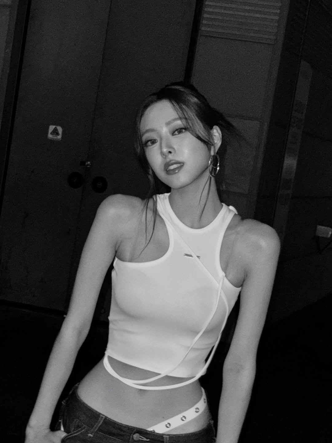 Photo by YUNA on August 10, 2025. May be an image of 1 person, hair, makeup, top, bra and text.