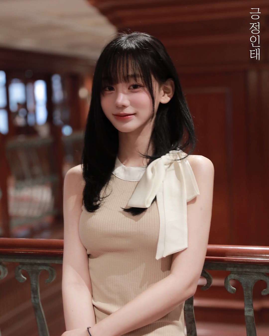 Photo by 오연하 on March 20, 2025. May be an image of 1 person, hair, top, dress and text.