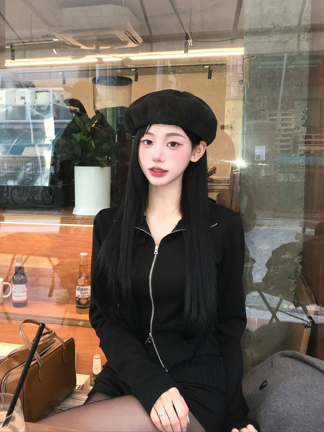 Photo by 오연하 on October 29, 2025. May be an image of one or more people, hair, hat, beret, fishnet stockings, tights and text.