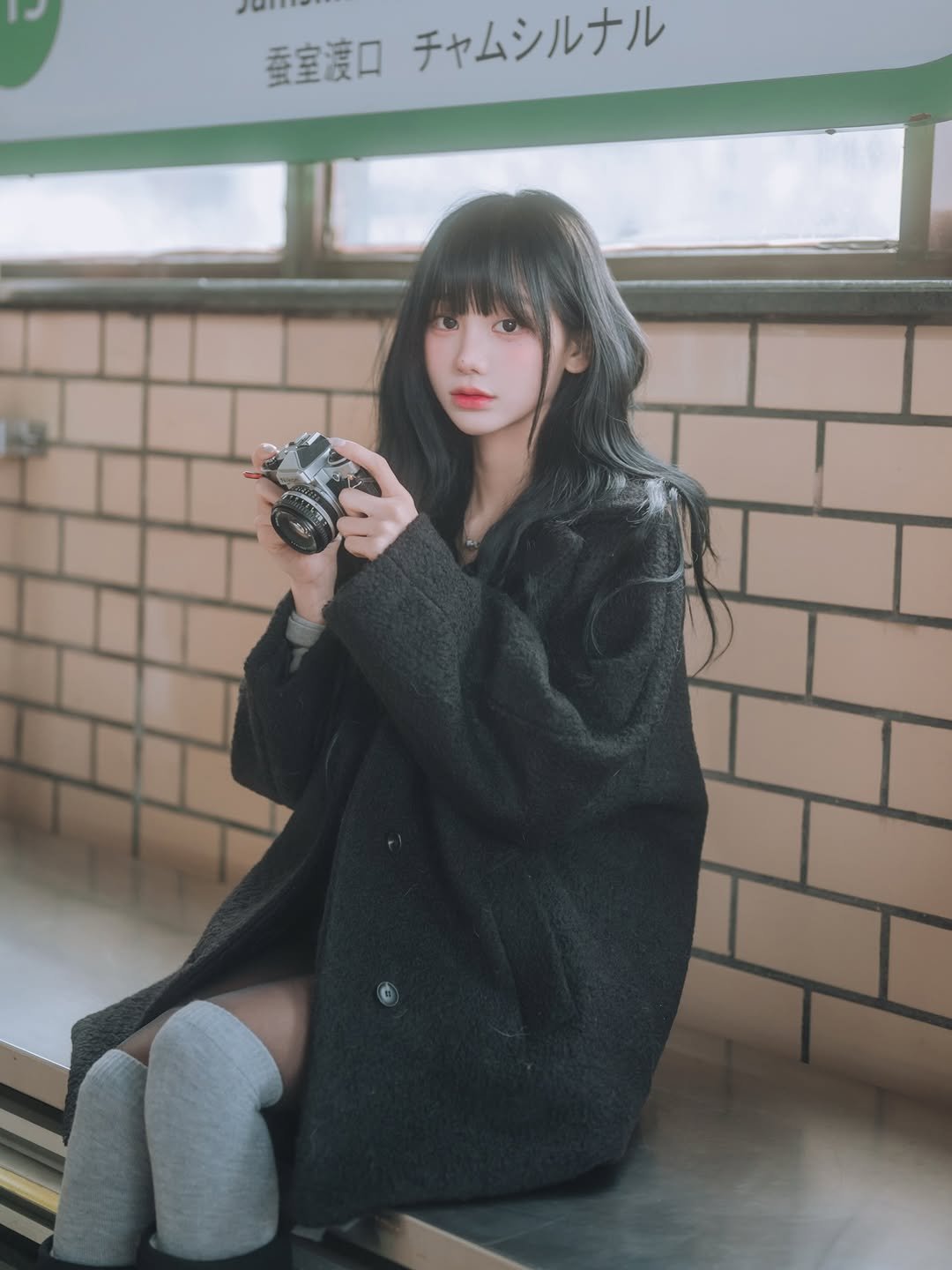 Photo shared by 제브 on February 07, 2026 tagging @ihate._.eggplant. May be an image of duffle coat, overcoat, jacket, bath robe, parka, raincoat, beret, cloak and text.