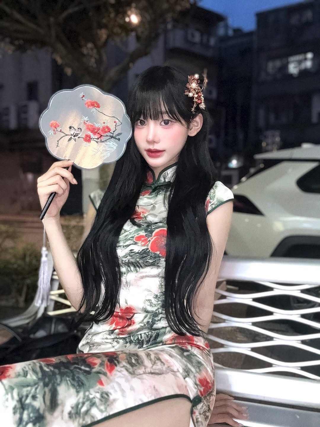 Photo by 오연하 on September 20, 2025. May be an image of 1 person, hair, dress, parasol, umbrella and text.