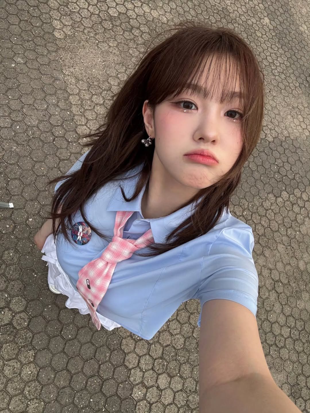 Photo by 김채현 KIM CHAEHYUN on June 07, 2025. May be an image of one or more people, hair and text.