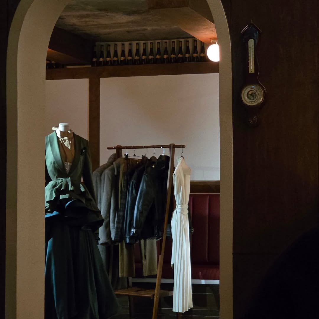 Photo shared by 김채현 KIM CHAEHYUN on January 26, 2026 tagging @zagae_official. May be an image of suit, overcoat, mannequin, display case, rack, clothes hanger, hat shop and text.