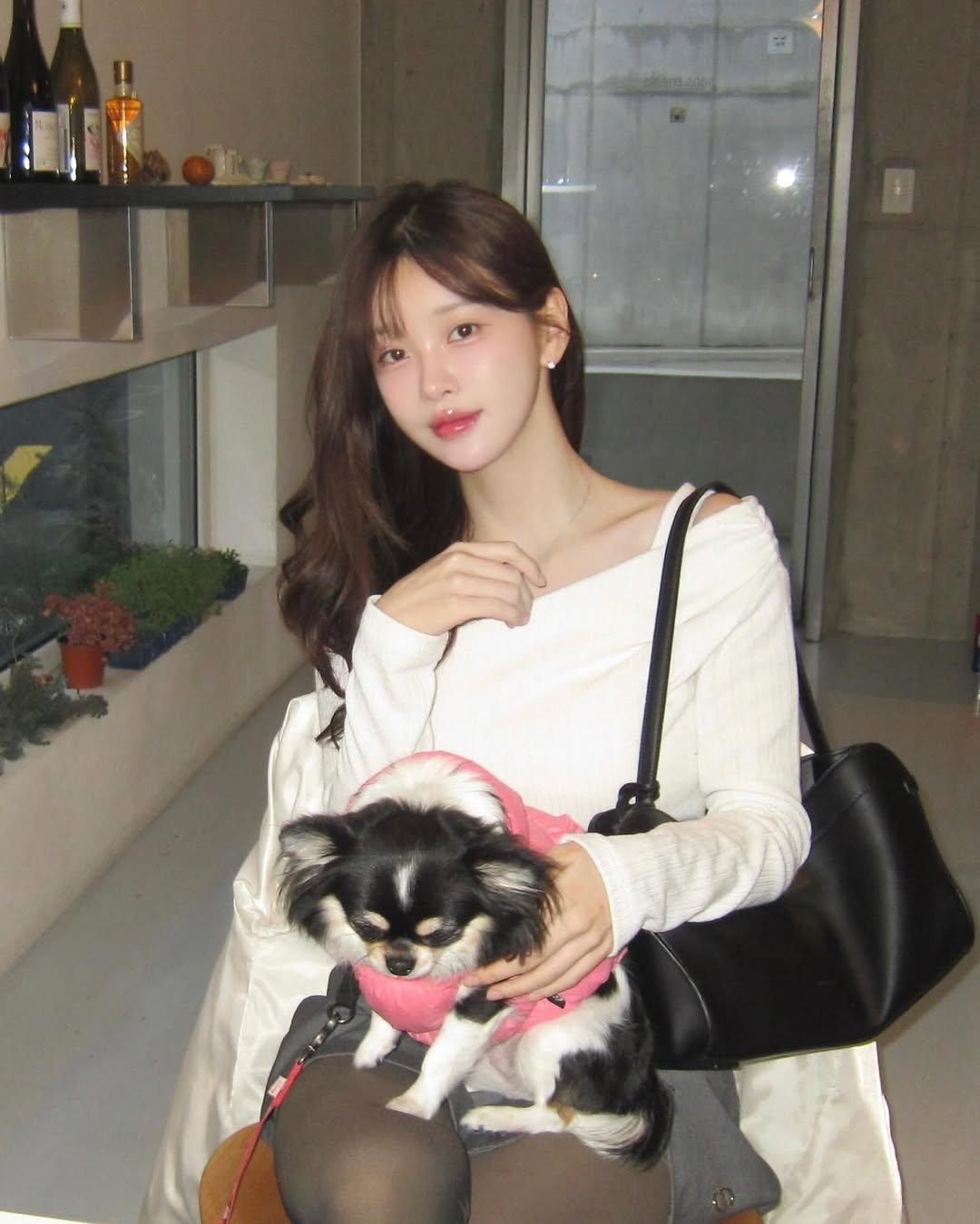 Photo shared by 김윤희 아나운서 on December 27, 2025 tagging @29cm.official. May be an image of one or more people, hair, Pekinese and text.