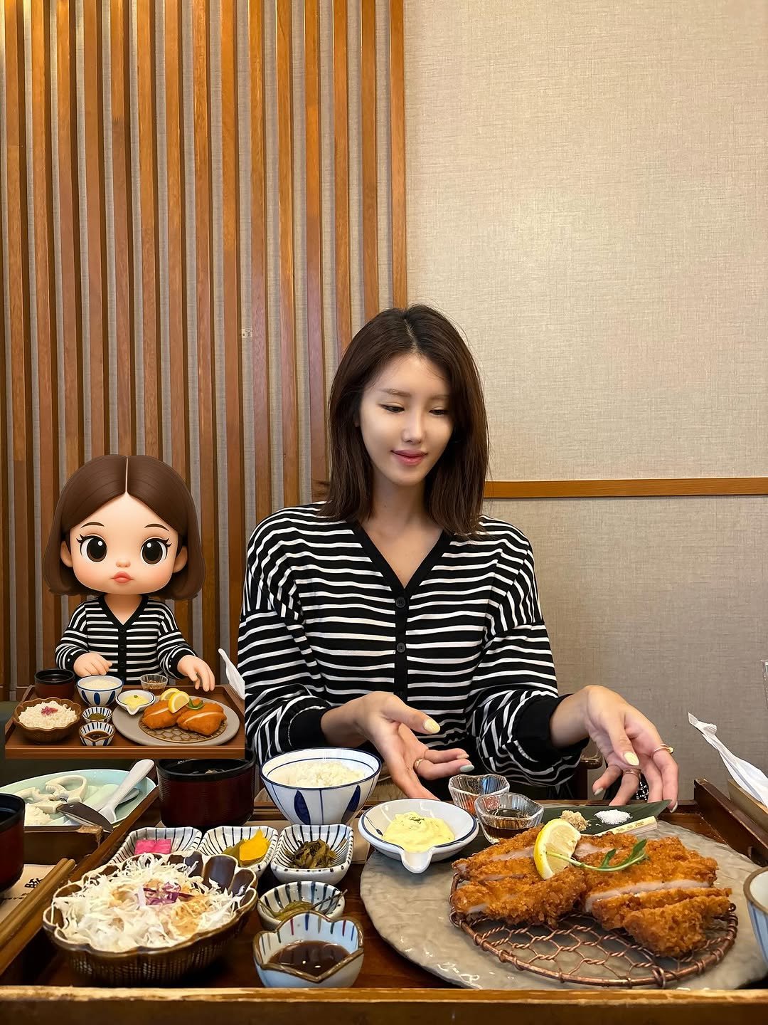 Photo shared by 라여사와 띠띠네 on August 10, 2025 tagging @mandon_ilsan. May be an image of 1 person, croquette, pancake, cutlet, fritter and text.
