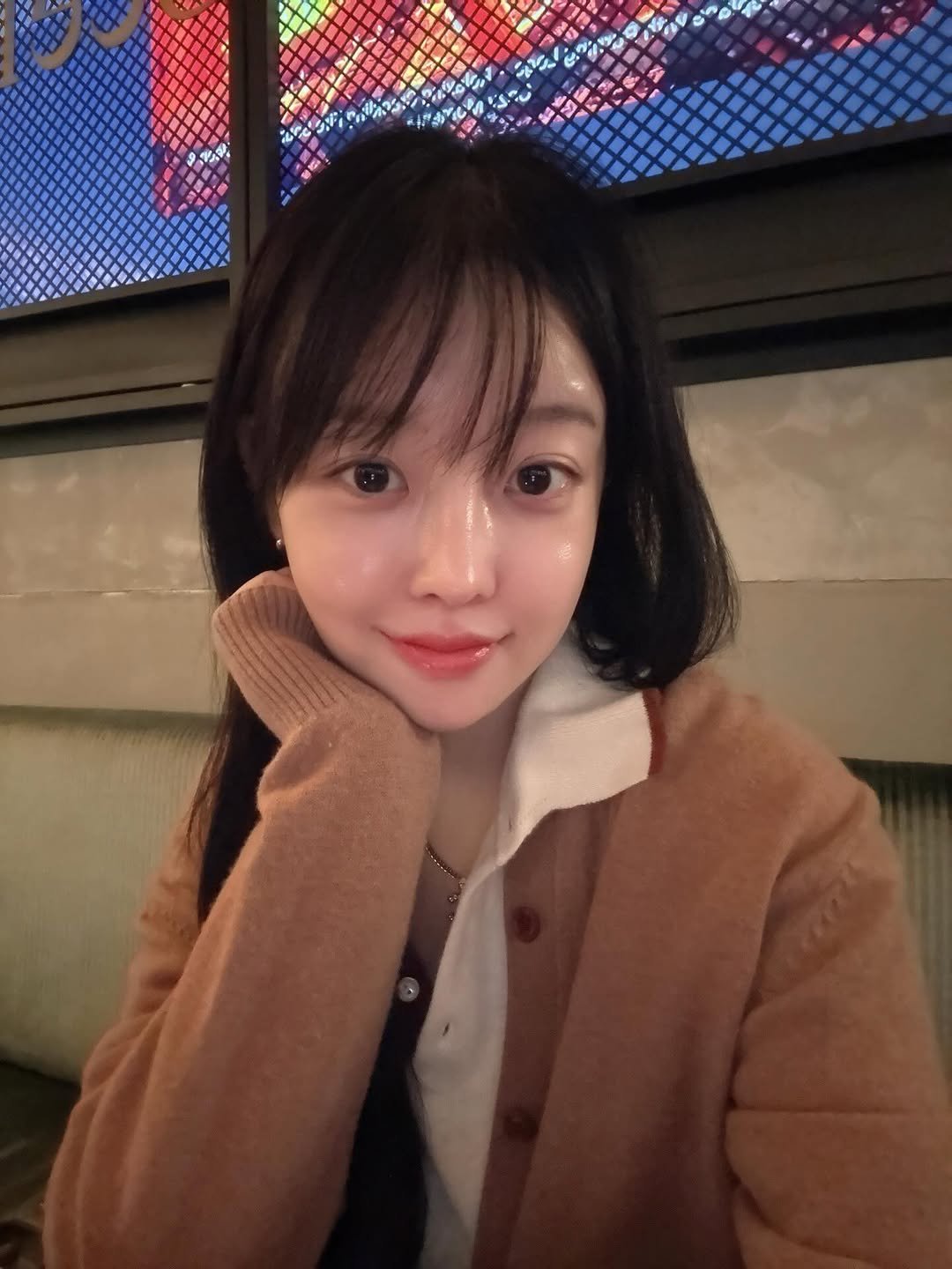 Photo by 임재원 on December 28, 2025. May be an image of one or more people, hair, duffle coat and text.